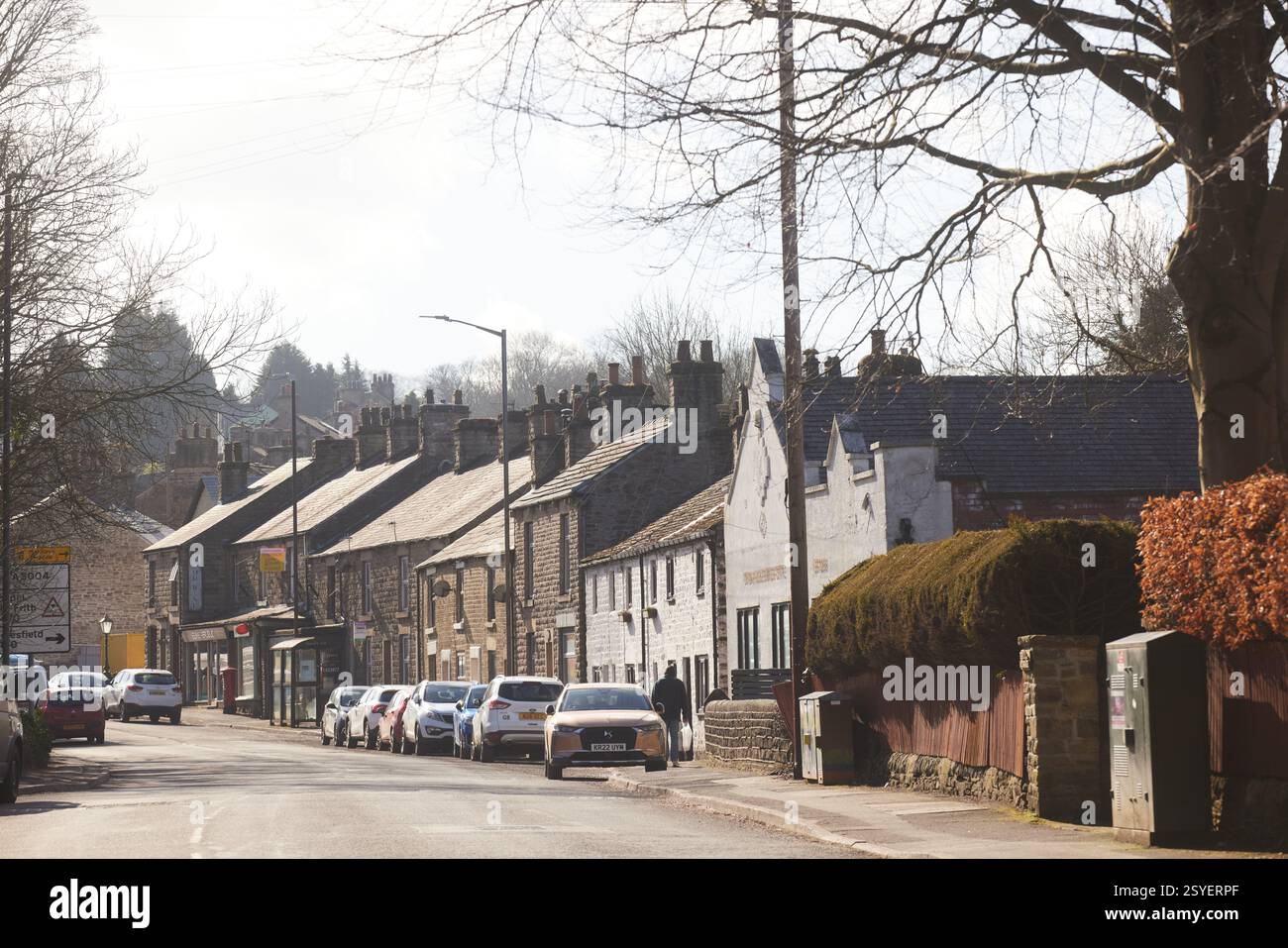 Shops and Houses on Buxton Road Whaley Bridge High Peak District of Derbyshire, Inghilterra Foto Stock