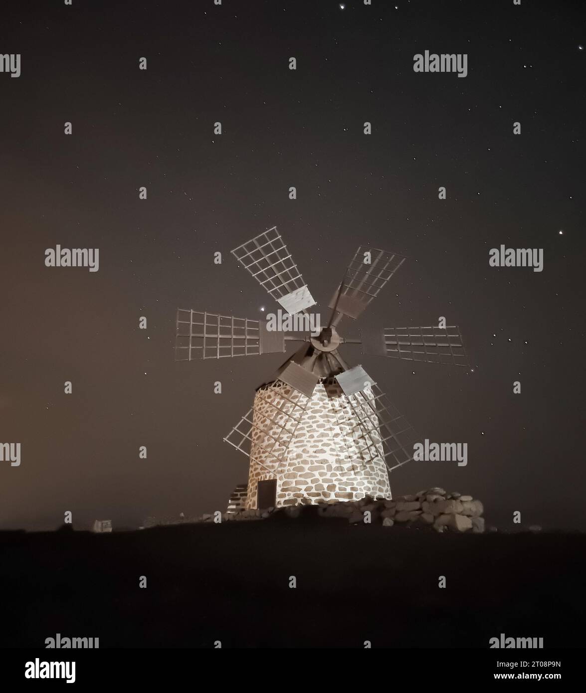 un mulino a vento di notte Foto Stock