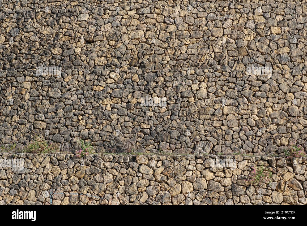 Muro di pietra a secco a Castell de Guadalest Foto Stock