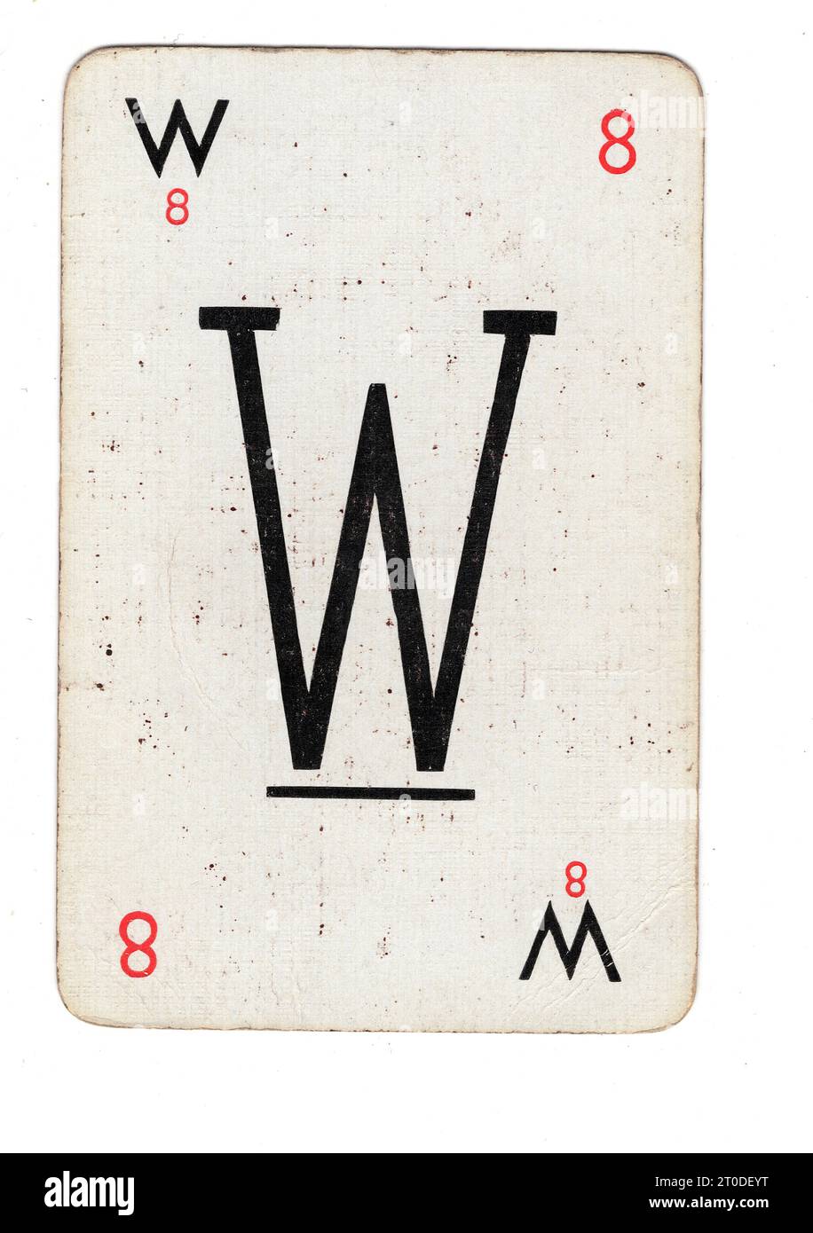 Una carta da gioco Lexicon vintage con la lettera W su sfondo bianco. Foto Stock