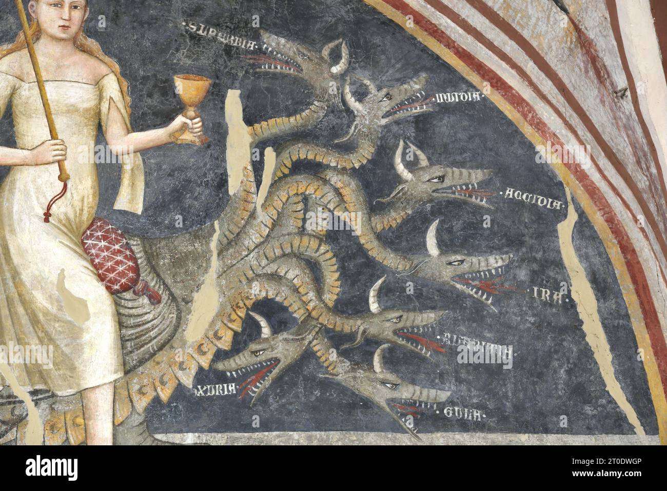 Fabriano (Italia, Marche - provincia di Ancona), chiesa di San Domenico (o Santa Lucia), sacrestia. Allegretto Nuzi e bottega, la donna di Babilonia con il mostro a sette teste (ciclo di affreschi della metà del XIV secolo) Foto Stock