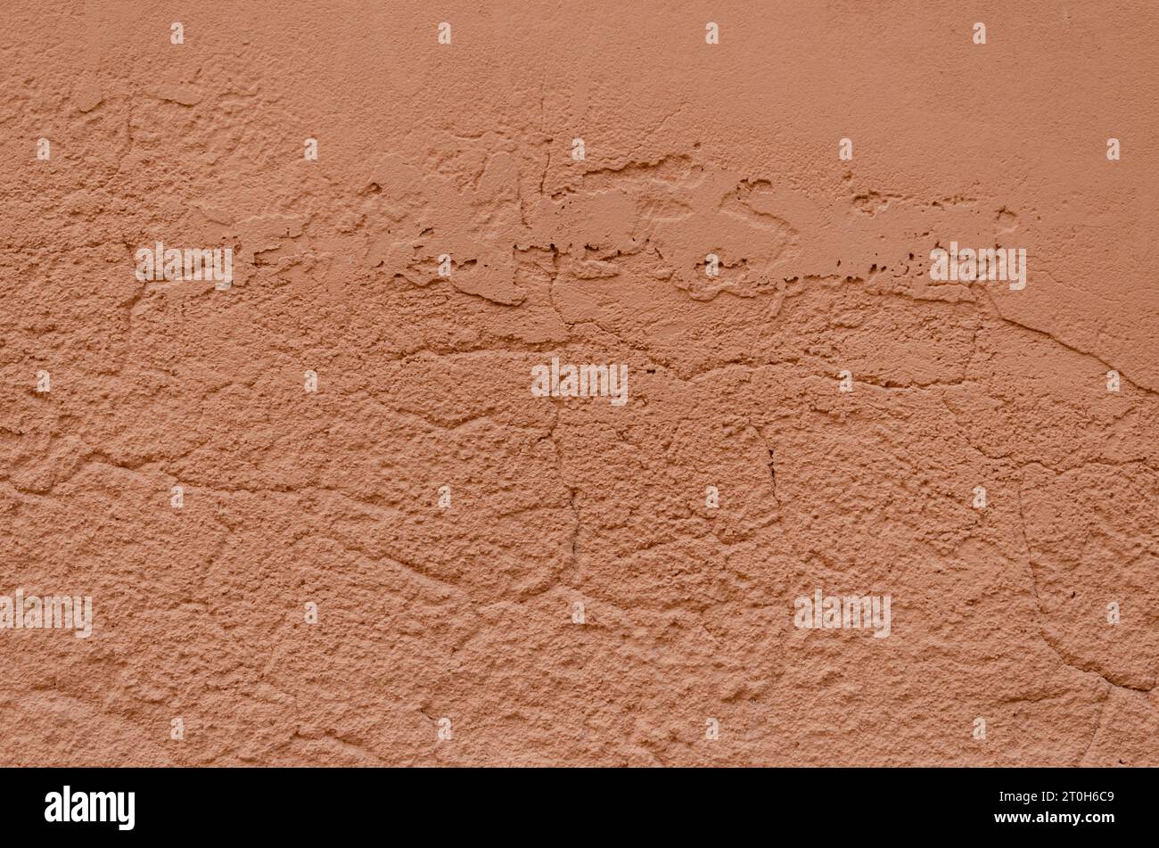 Parete in mattoni grunge di un antico edificio veneziano per il tuo sfondo. Architettura e patrimonio italiano. Foto Stock