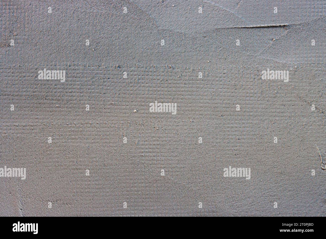 Superficie liscia per pareti in cemento, sfondo astratto di colore grigio Foto Stock