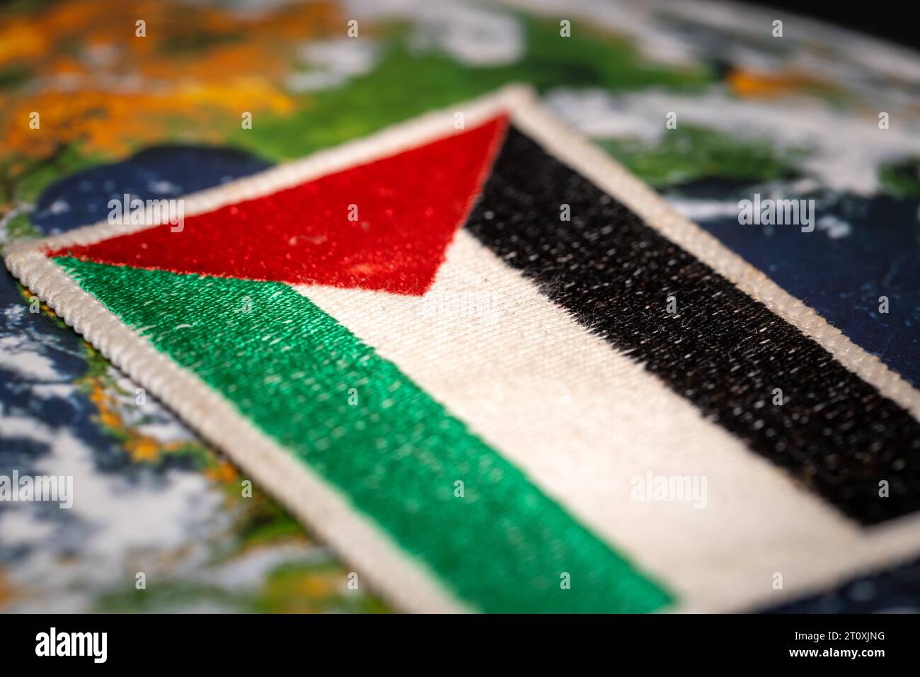 Bandiera della Palestina sullo sfondo del mondo, concetto, situazione politica, Striscia di Gaza Foto Stock