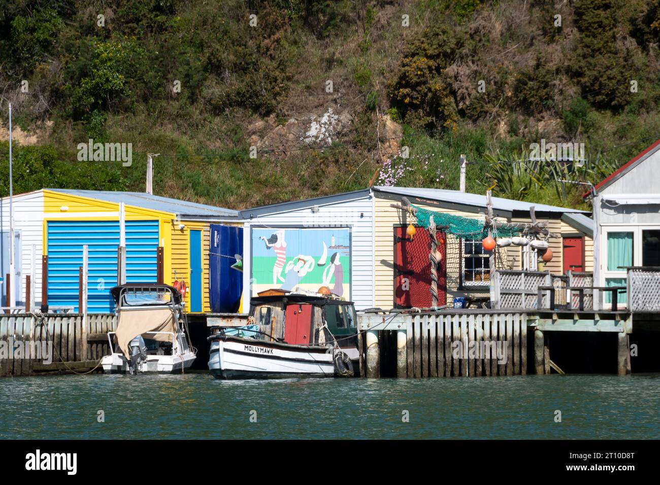 Boatsheds, Paremata, Pauatahanui Inlet, Porirua Harbour, Wellington, North Island, nuova Zelanda Foto Stock