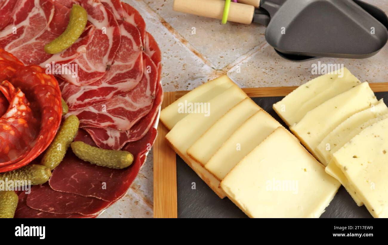salumi e raclette Foto Stock