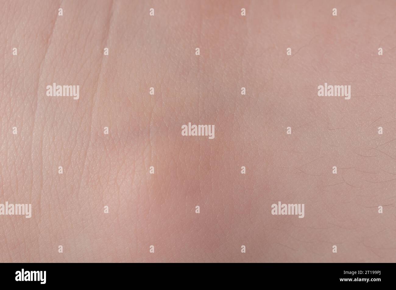 Vista ravvicinata macro di sfondo della pelle umana di colore beige chiaro Foto Stock
