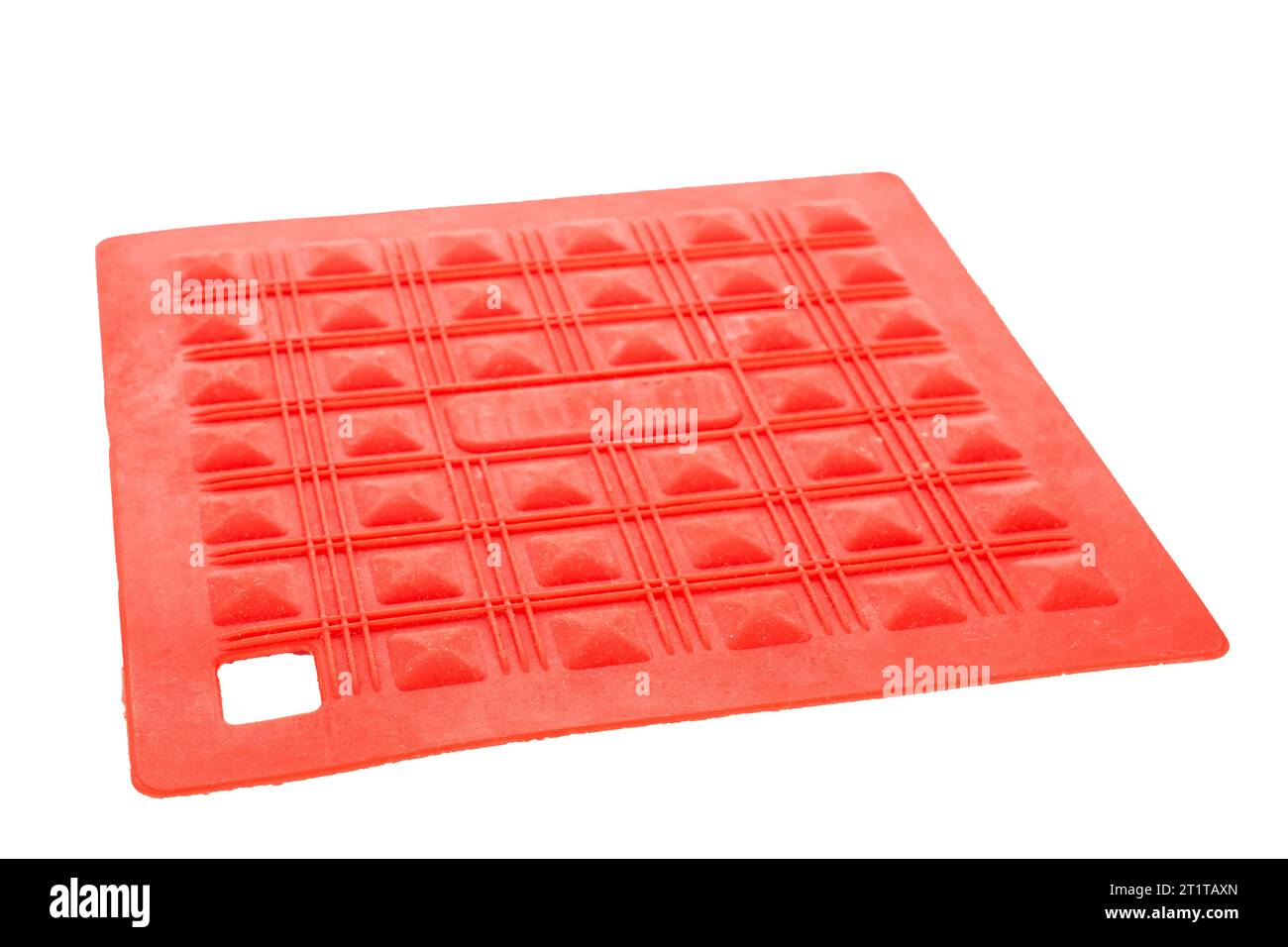 Un supporto per recipiente in silicone, macro, isolato su sfondo bianco. Foto Stock