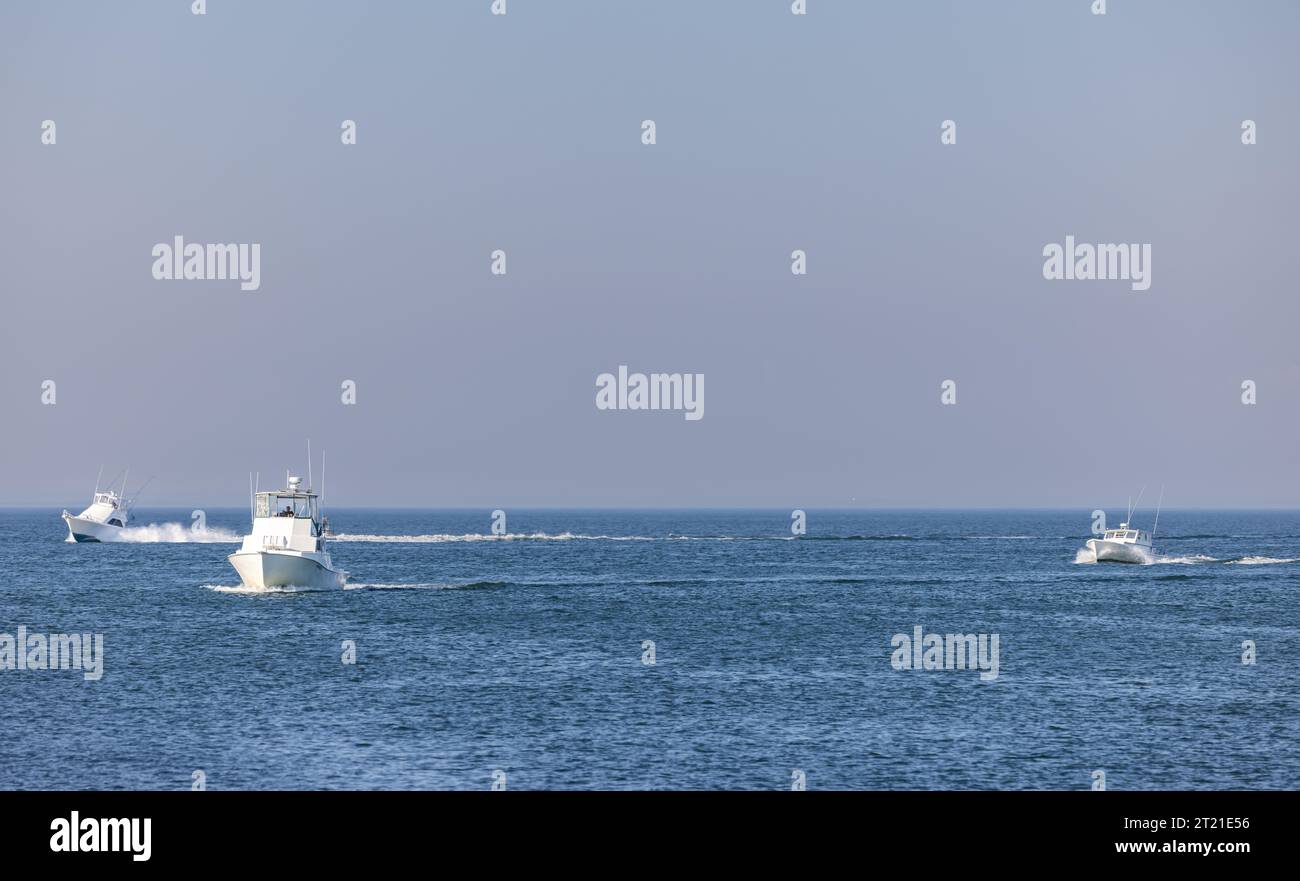 tre motoscafi in partenza da montauk Foto Stock