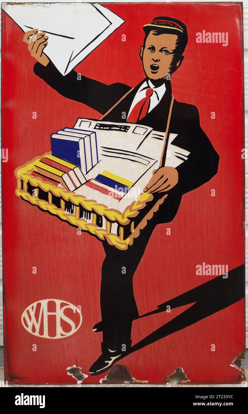 Cartello pubblicitario originale in smalto W.H. Smith Paper Boy degli anni '1930 Foto Stock