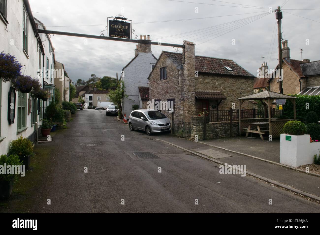 The George, Frome Road, Nunney, Somerset, Inghilterra. Foto Stock