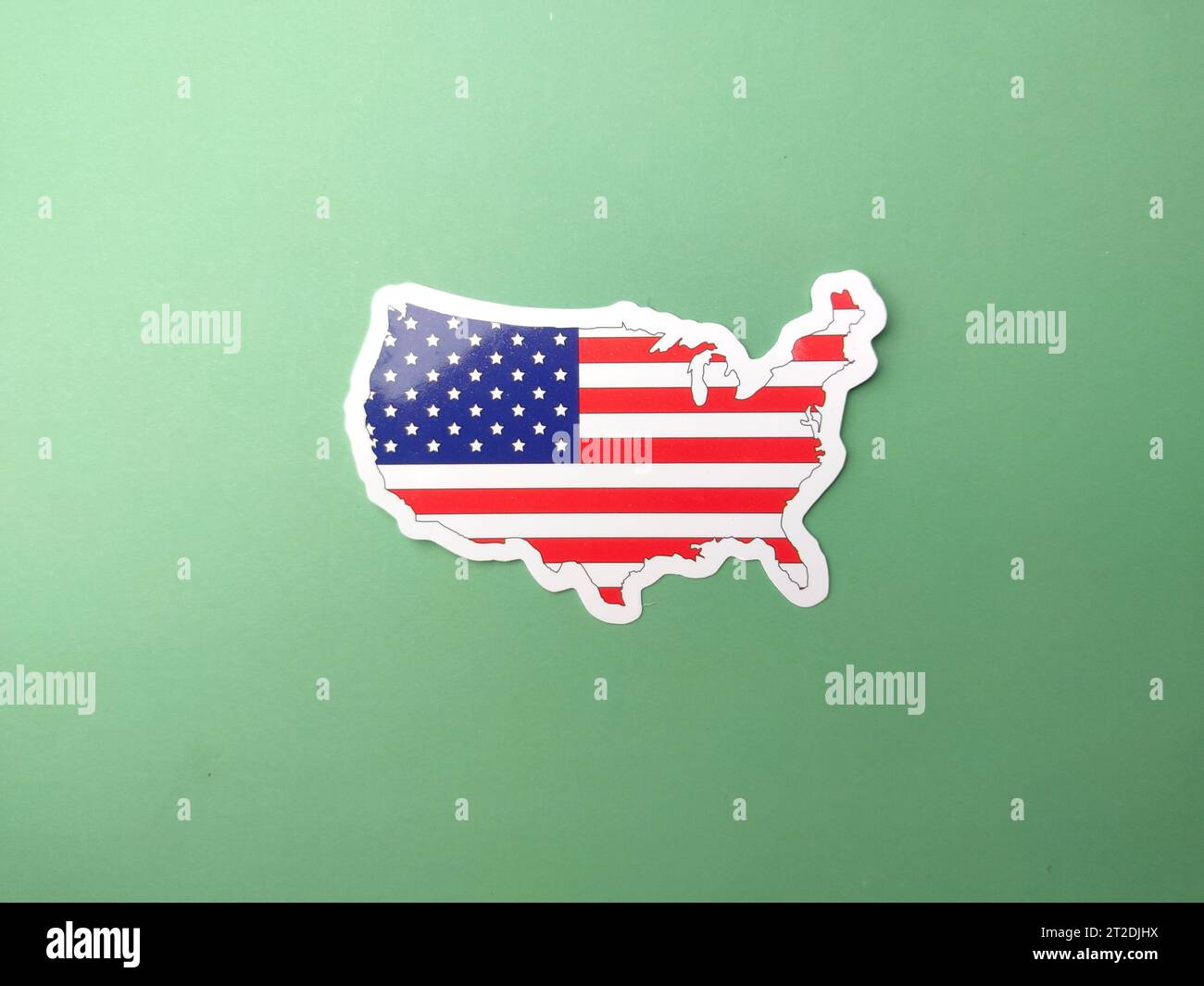 Adesivi con bandiera degli Stati Uniti d'america su sfondo verde. Foto Stock