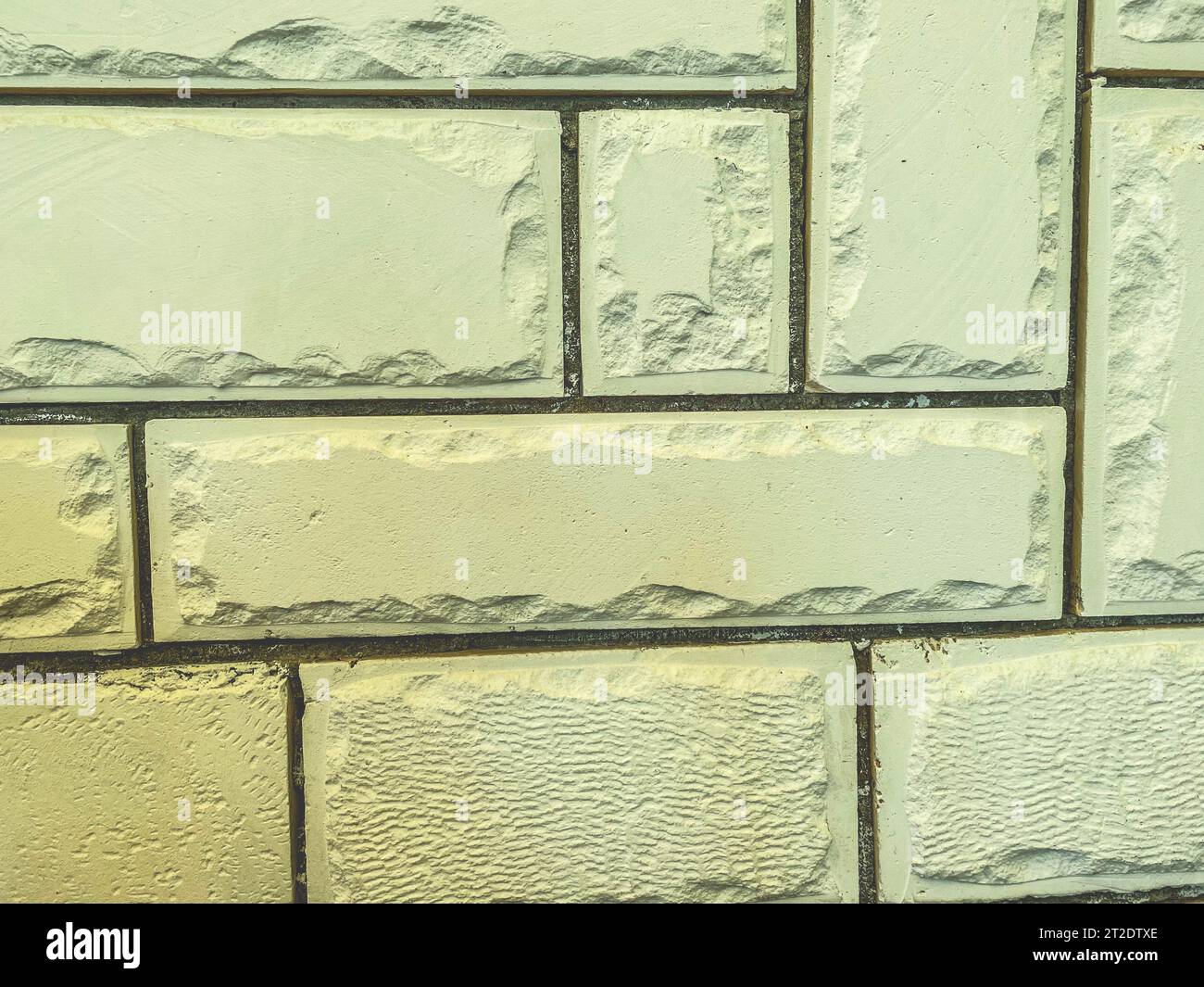 trama. mattoni bianchi di cemento. rivestimento protettivo per pareti. mattoni bianchi come elemento decorativo. sfondo 3d volumetrico, texture mattoni. Foto Stock