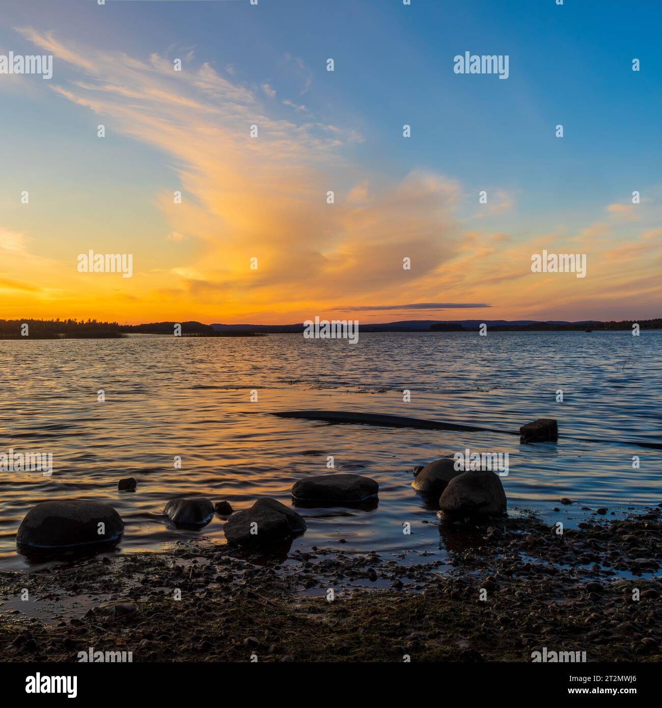 Nuvole vorticose al tramonto Foto Stock