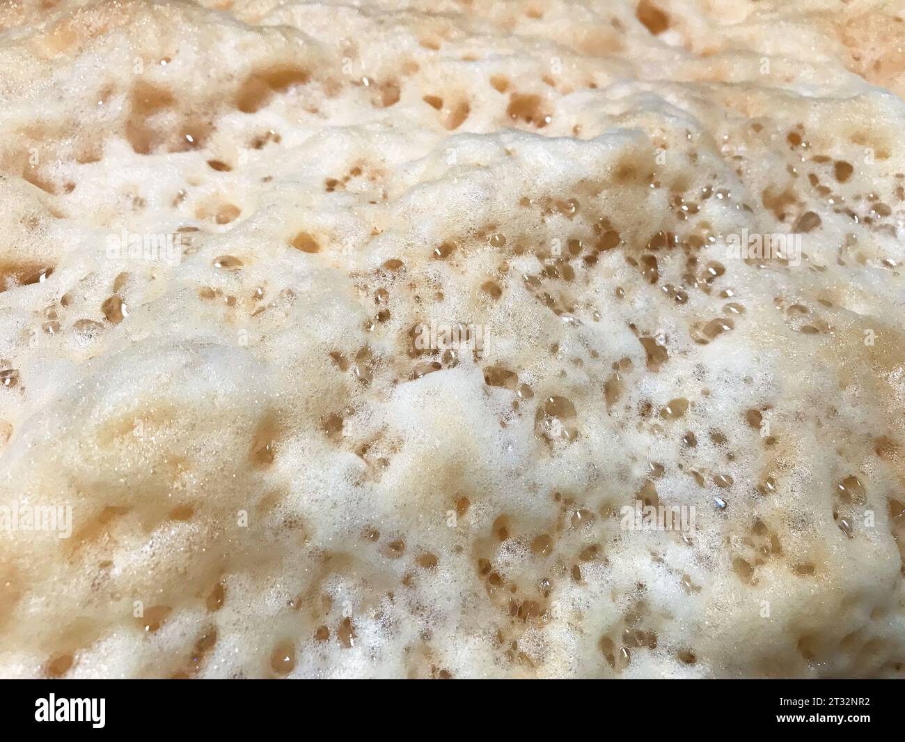 Foto macro delle bollicine di caffè. latte o cappuccino Foto Stock