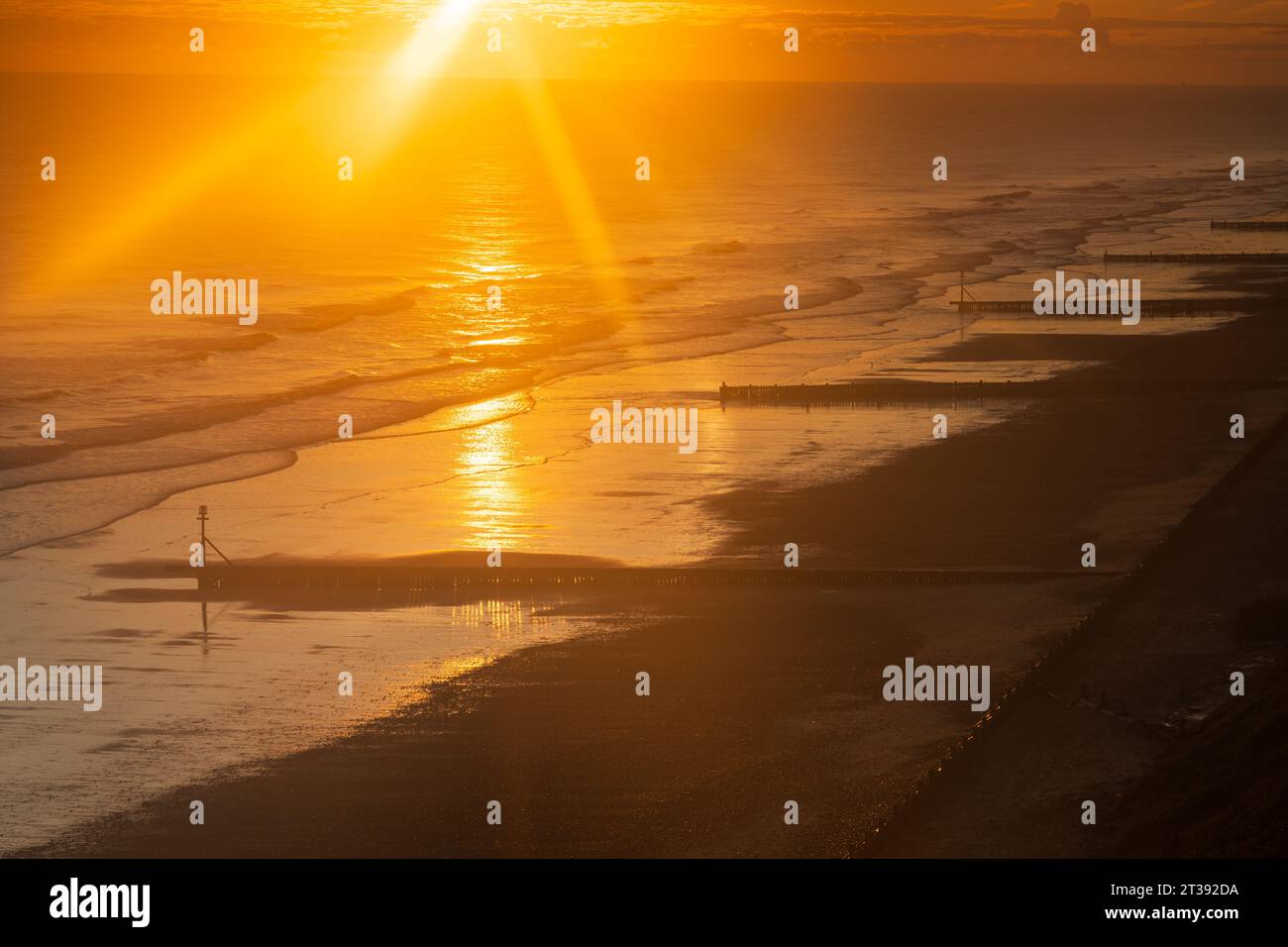 Alba a Trimingham Beach nel Nord Norfolk, Regno Unito Foto Stock