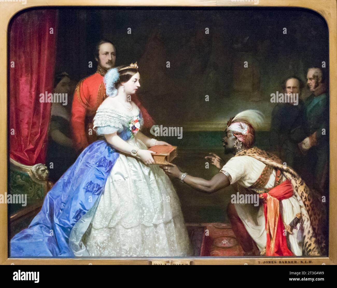 "The Secret of England's Greatness" (la Regina Vittoria presenta una Bibbia alla camera del pubblico a Windsor) di Thomas Jones Barker Foto Stock