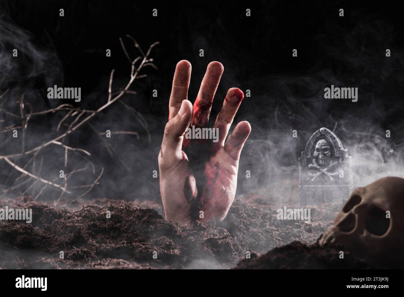 Mano che fuoriesce dalla nebbia di massa Foto Stock