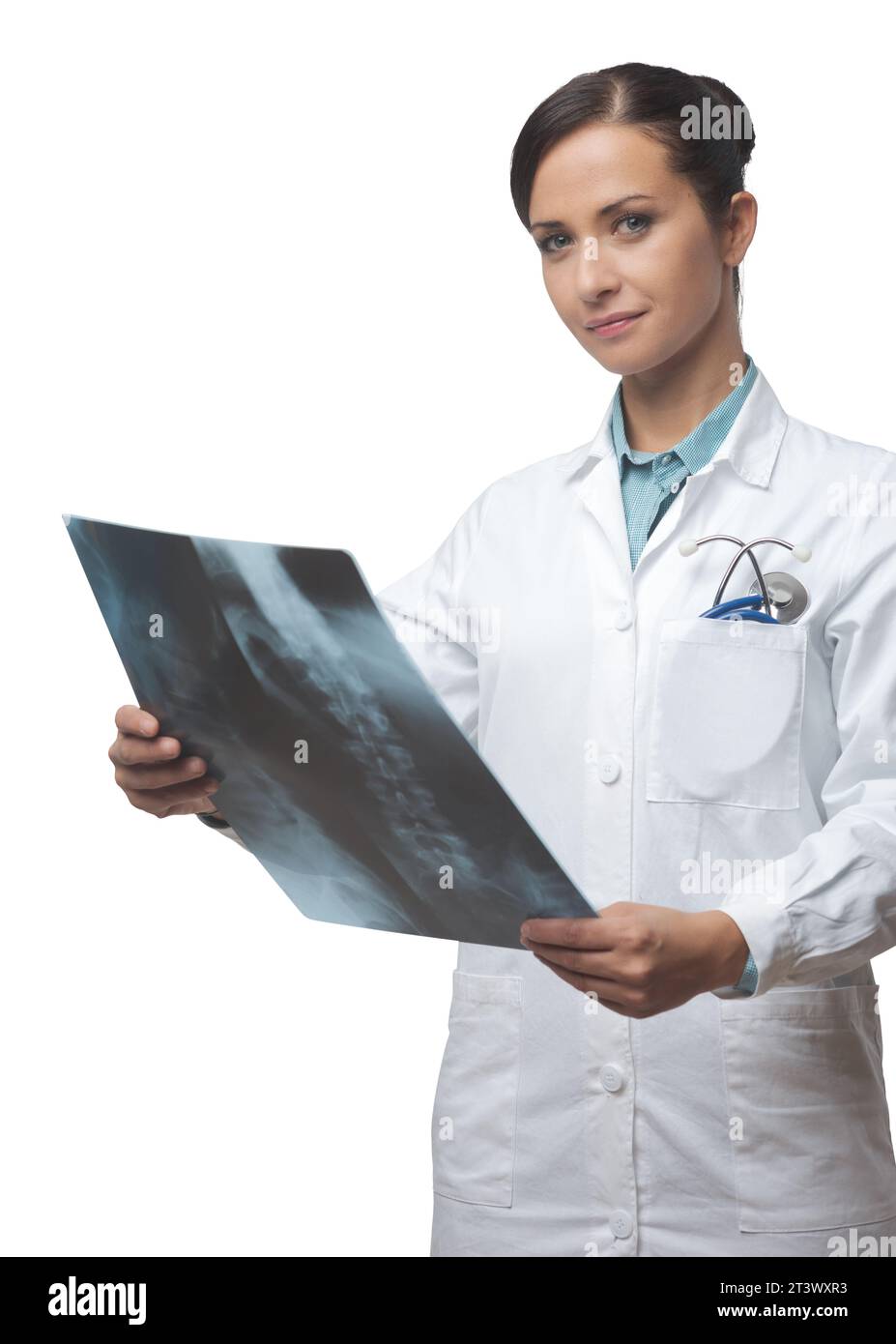 Fiducioso femmina di controllo da parte del radiologo di esami di immagine a raggi x della colonna vertebrale. Foto Stock