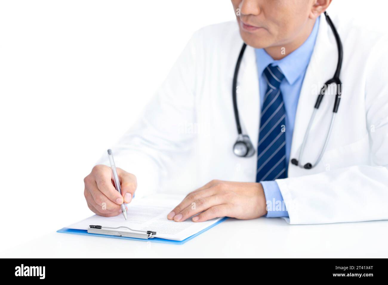 Medico prendendo appunti Foto Stock
