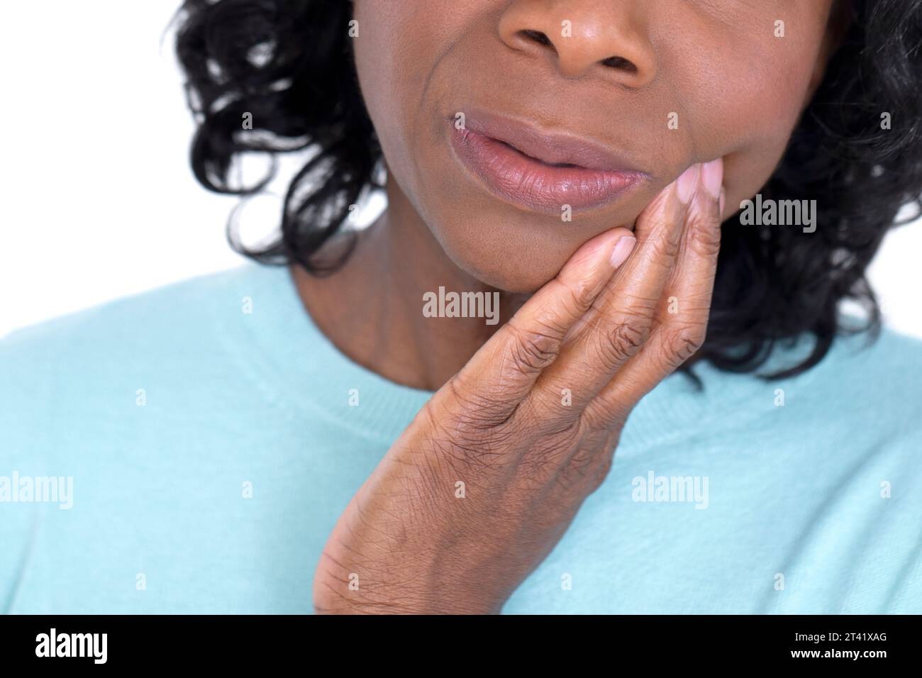 Donna con il mal di denti Foto Stock