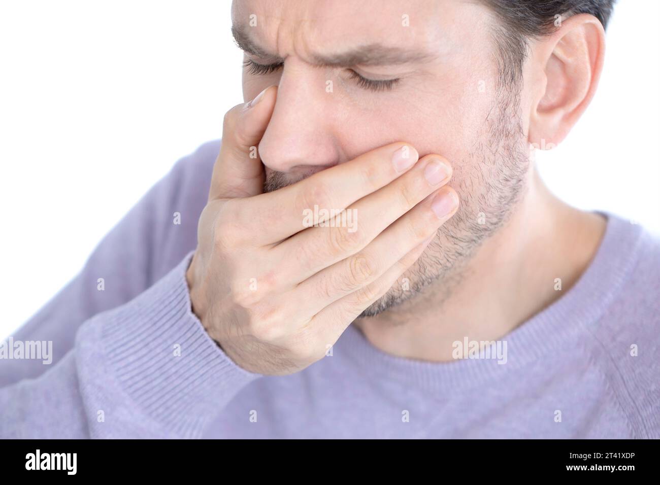Un uomo che si sente nauseato Foto Stock