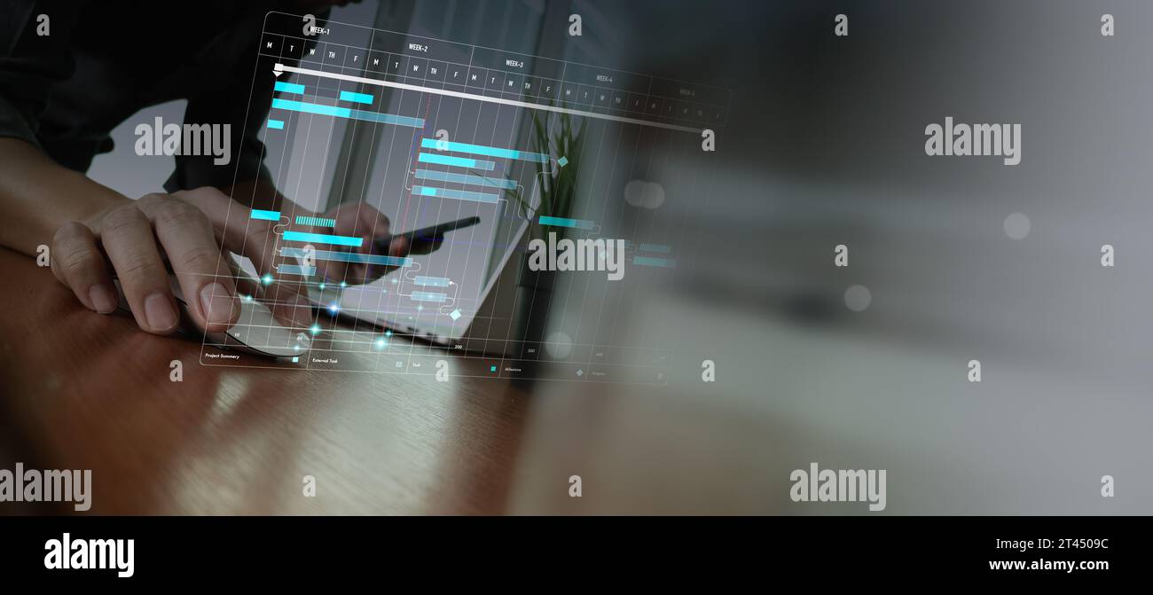 Project manager che lavora e aggiorna le attività con le fasi cardine della pianificazione dei progressi e gli investitori professionisti che lavorano per un nuovo progetto di Start-up ufficio moderno. Foto Stock