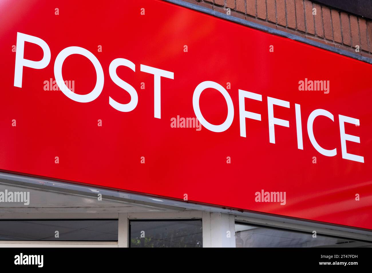 Cartello dell'ufficio postale sulla parete esterna del Regno Unito Foto Stock