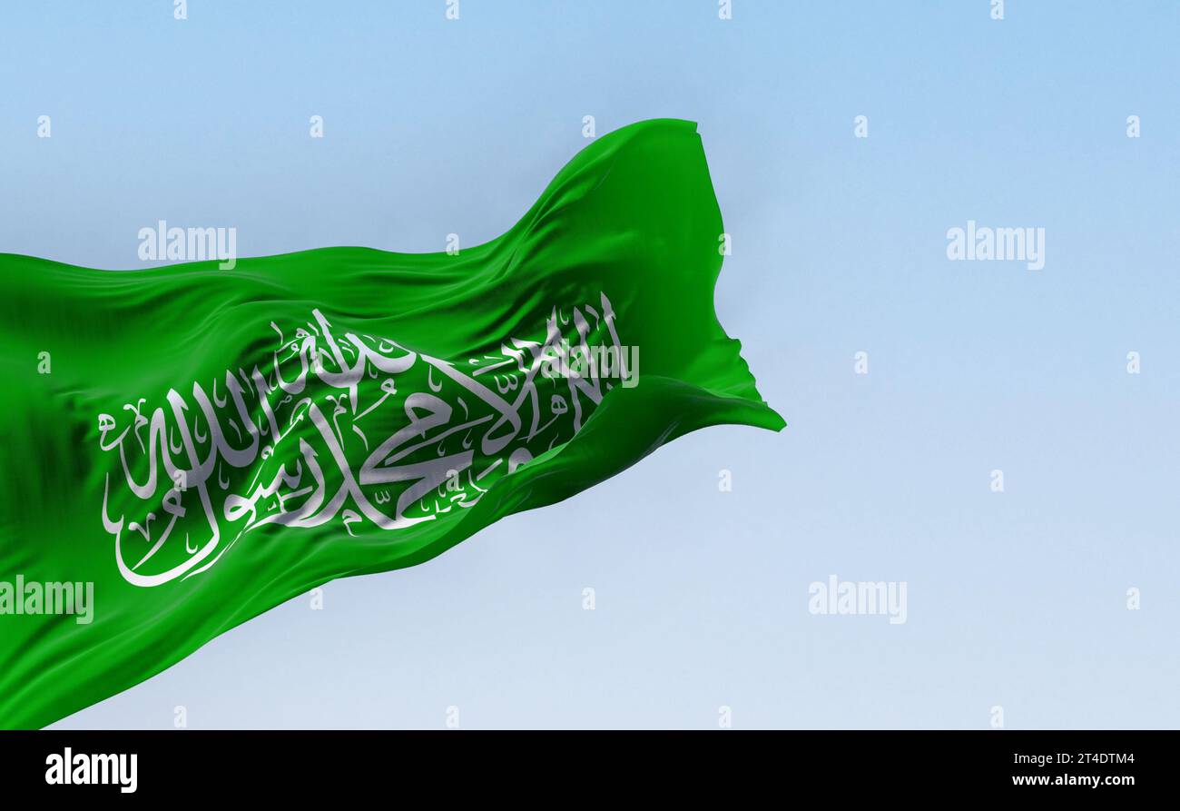 Bandiera di Hamas che sventola nel vento in una giornata limpida. Organizzazione politica e paramilitare palestinese. Shadada bianca su sfondo verde. illustrati 3d. Foto Stock