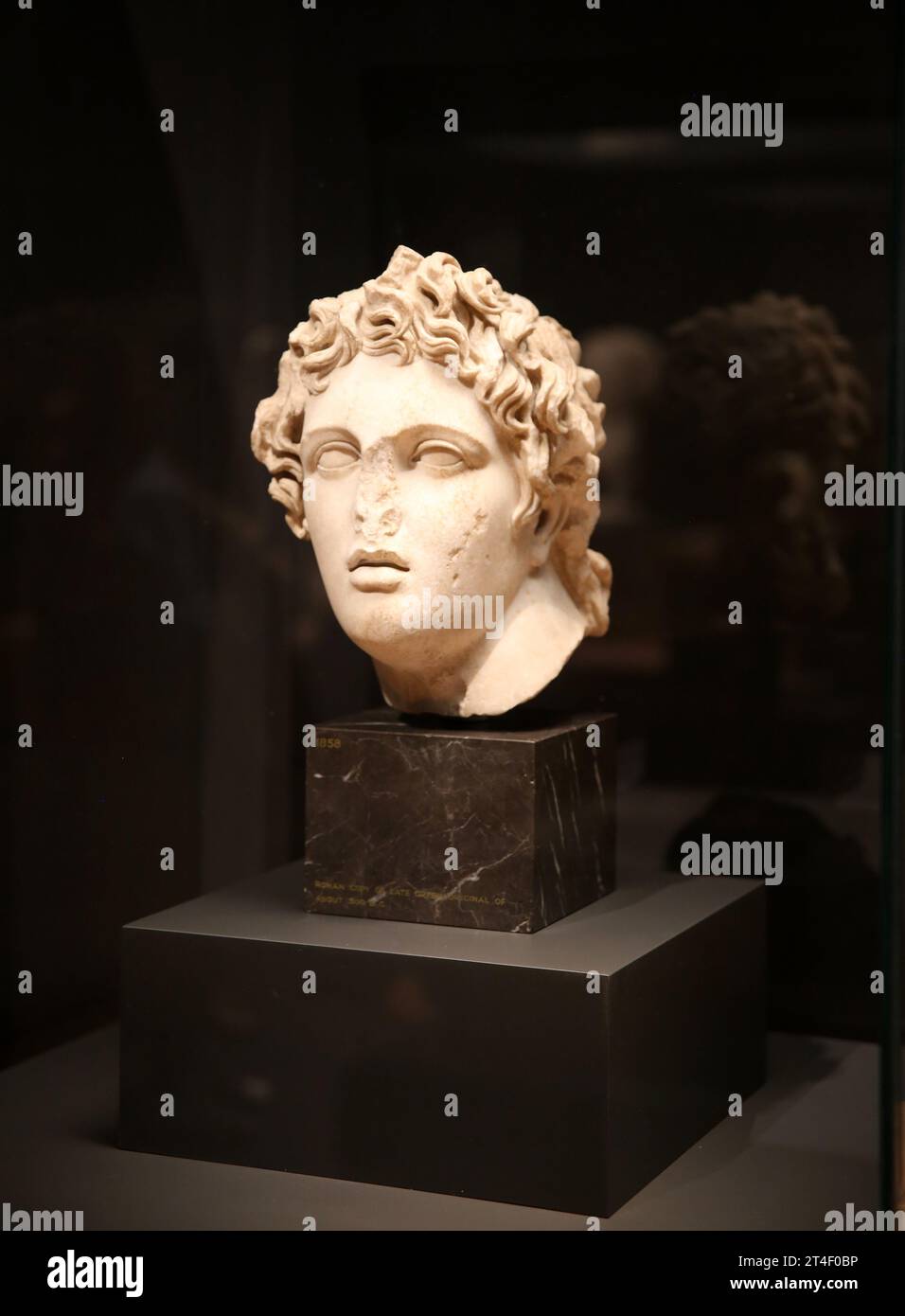 Testa eroe stile di Alessandro Magno (356 a.C.-323 a.C.). Impero romano. ii secolo. Marmo. Esporre l'immagine umana. Spagna. Foto Stock