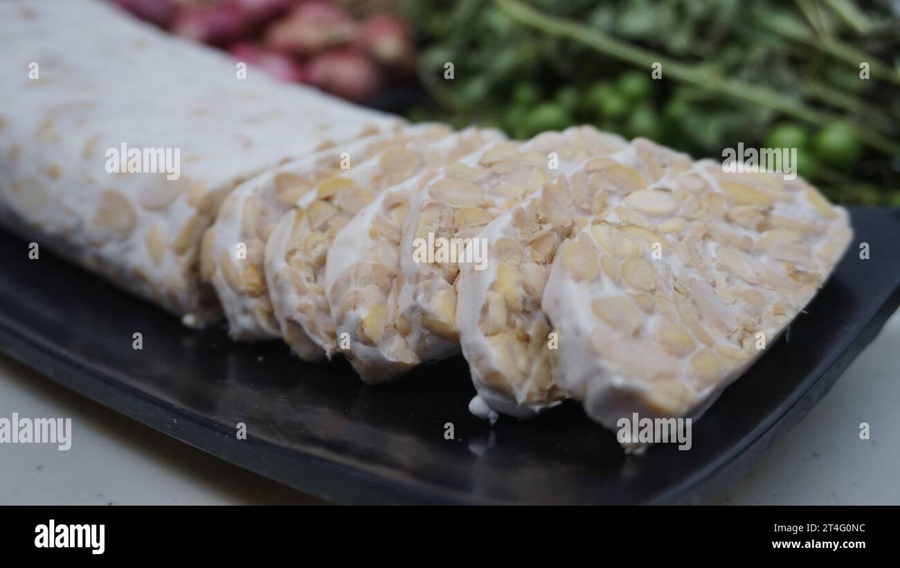 Tempe è una soia fermentata ad alto contenuto proteico Foto Stock