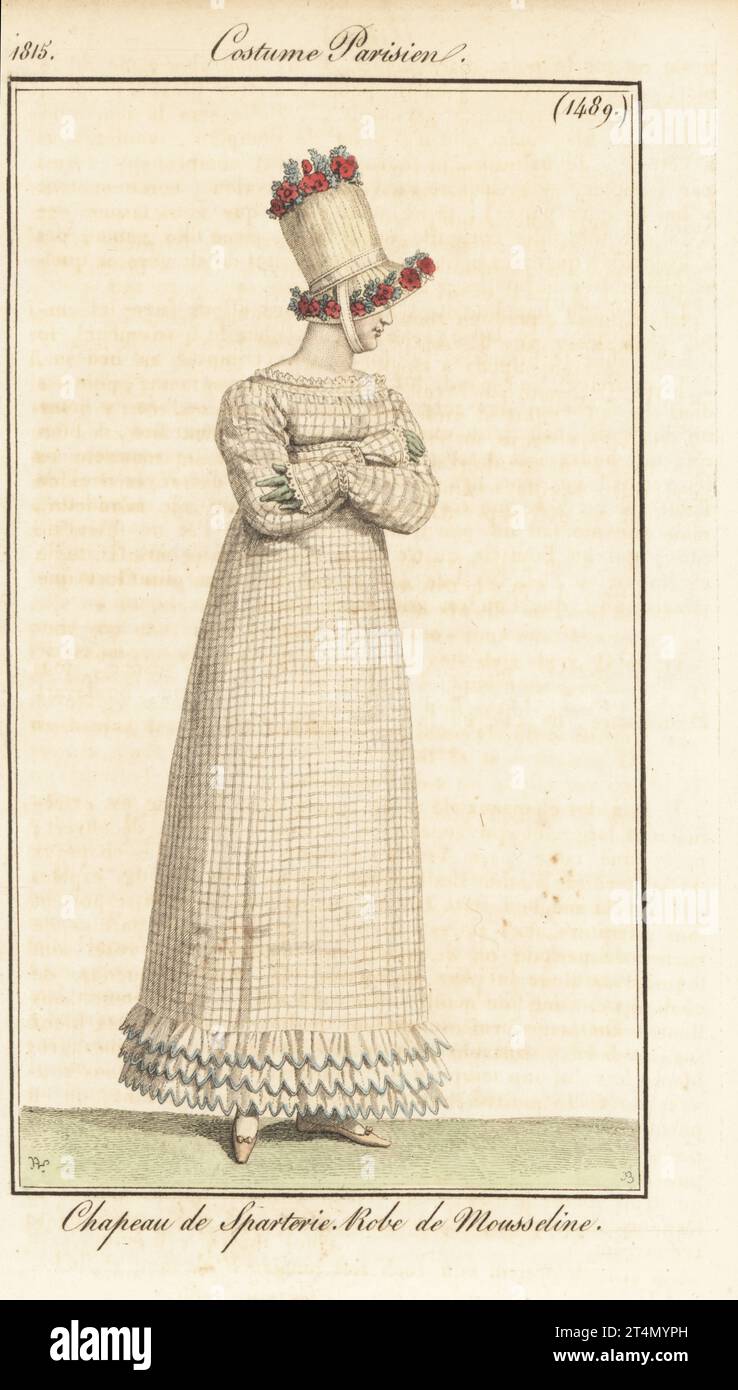 Donna francese con cappello in vimini decorato con fiori, abito a scacchi in muslin. Chapeau de sparterie, robe de mousseline. Incisione a mano su copperplate di Jean Charles Baquoy dopo un piatto di moda di Horace Vernet dal Journal des Dames et des Modes di Pierre de la Mesangere, Magazine of Women and Fashion, Parigi, 1815. Foto Stock