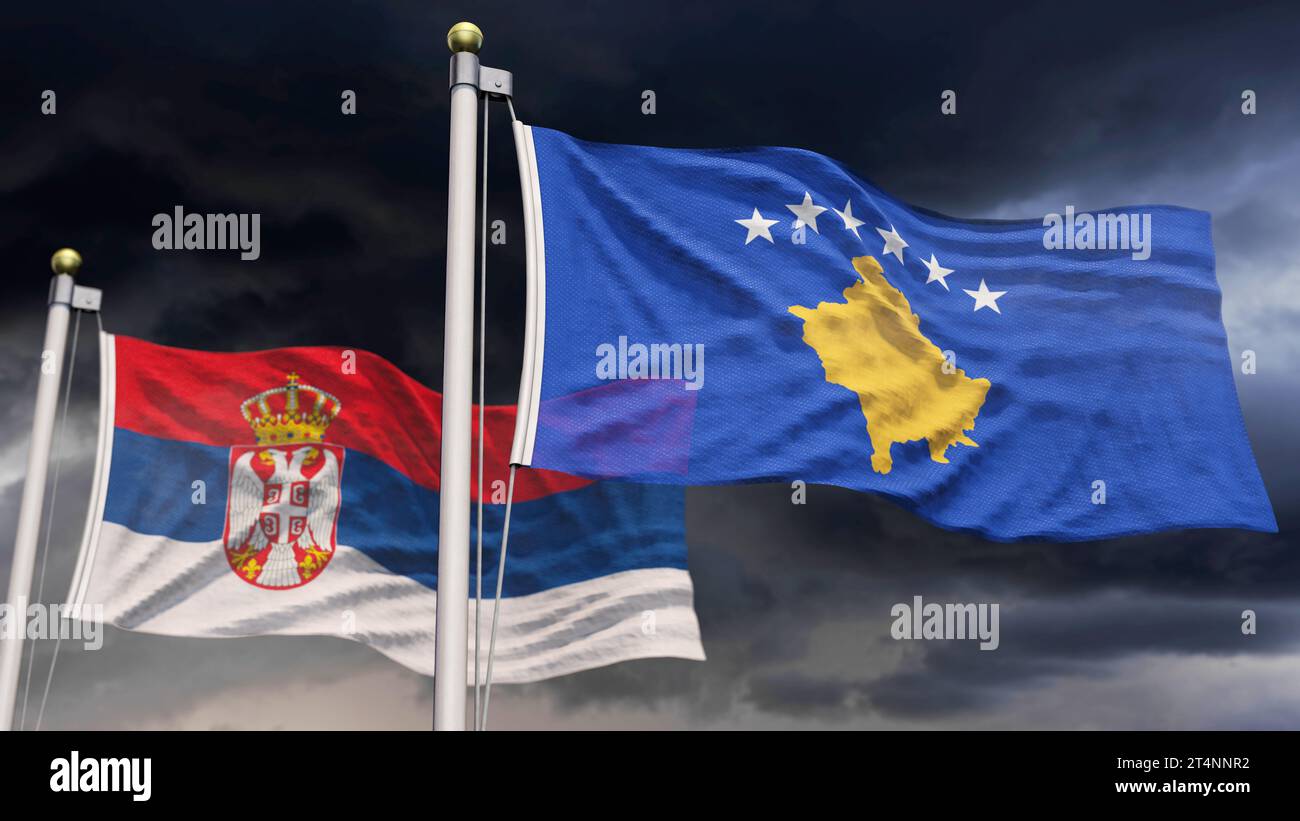 Bandiera del Kosovo e bandiera della Serbia davanti al cielo nuvoloso Foto Stock