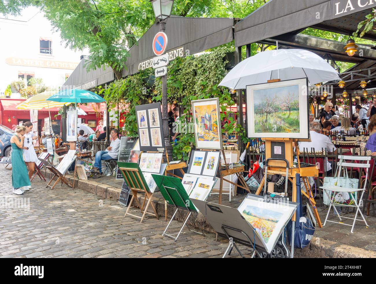 L'artista si spegne in Place du Tertre, Montmartre, Parigi, Île-de-France, Francia Foto Stock