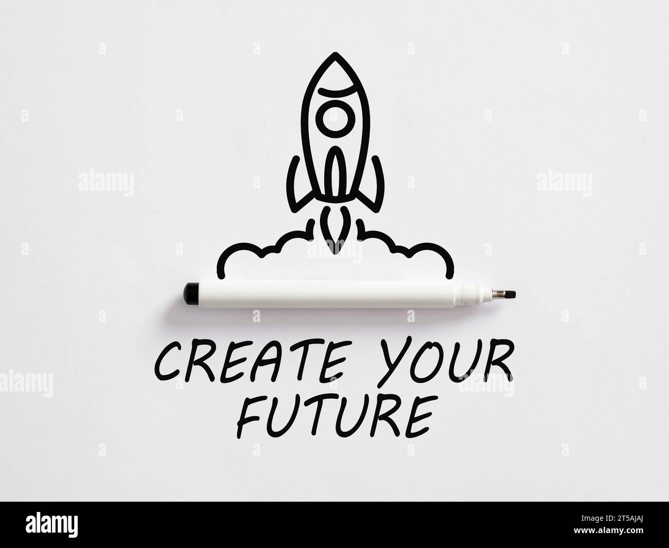 Crea il tuo futuro. Esplora le carriere creative e costruisci un futuro migliore. Messaggio motivazionale scritto a mano Crea il tuo futuro con un razzo e una penna. Foto Stock