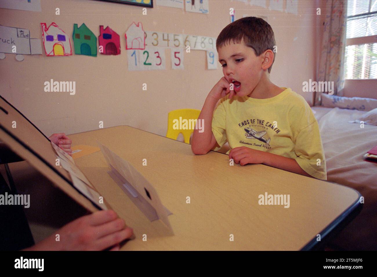 Insegnamento di autismo bambino Foto Stock