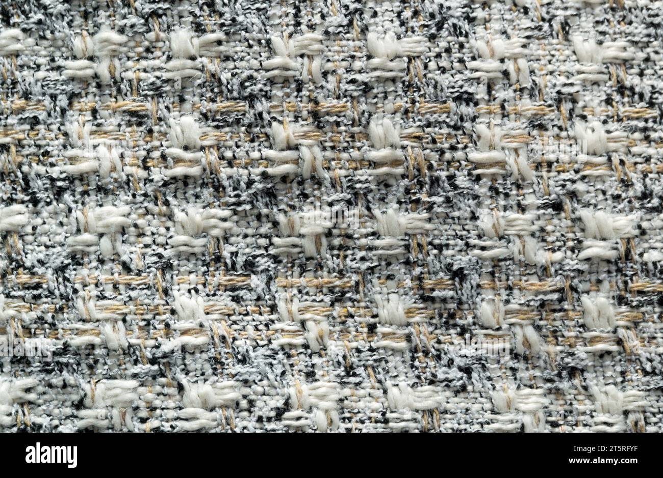 Tessuto a scacchi con colori chiari beige, grigio, nero e grigio primo piano. Sfondo astratto. Trama del tessuto. Foto Stock