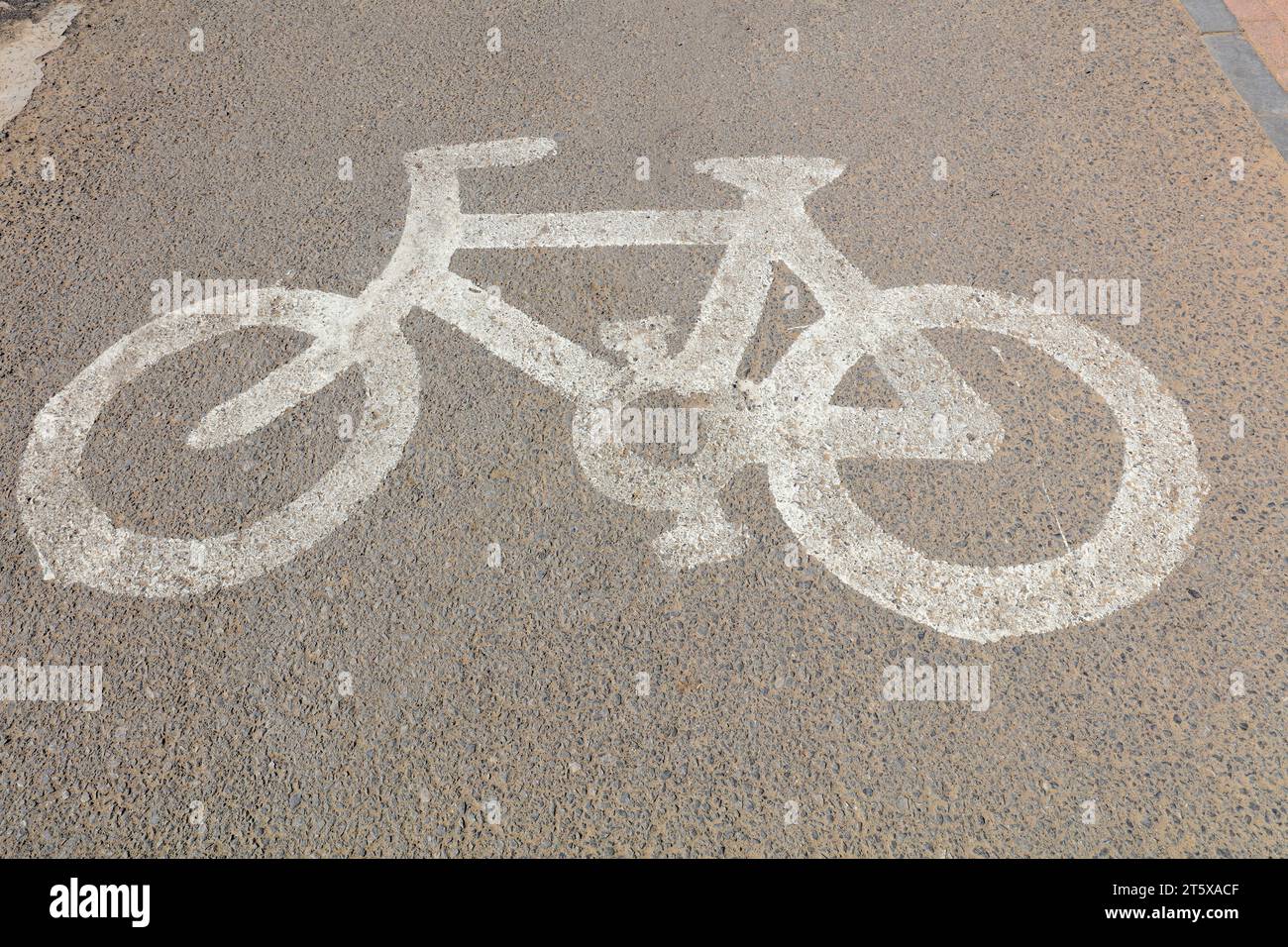 Segni di stile della bicicletta sul terreno Foto Stock