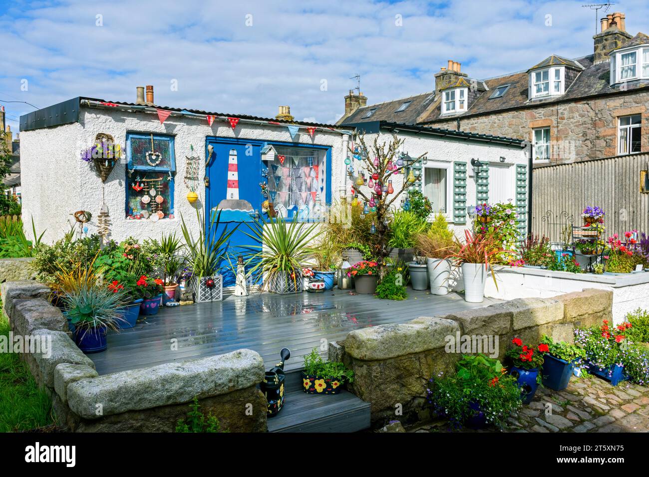 Cottage nello storico ex villaggio di pescatori di Footdee, le abitazioni sono disposte in piazze con le spalle al mare. Aberdeen, Scozia, Regno Unito Foto Stock
