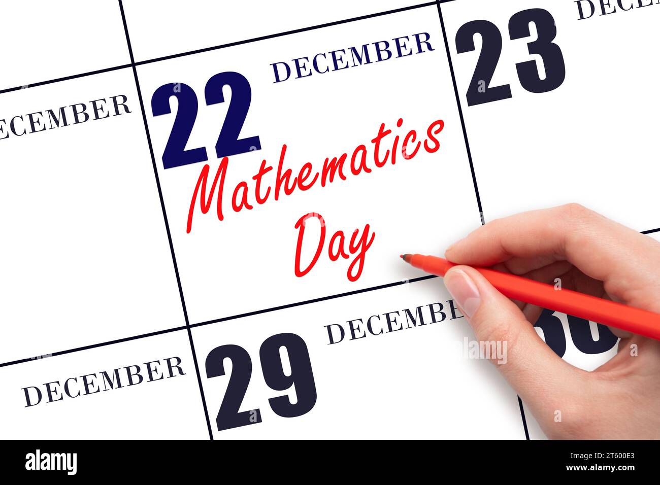 22 dicembre. Scrivere a mano il testo giornata matematica nella data del calendario. Segnatevi la data. Vacanze. Concetto di giorno dell'anno. Foto Stock