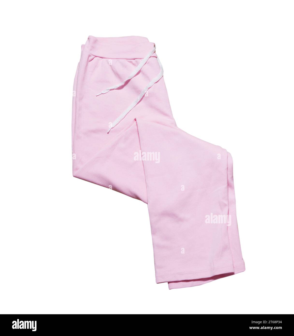 I pantaloni sportivi rosa ripiegati chiudono isolati Foto Stock