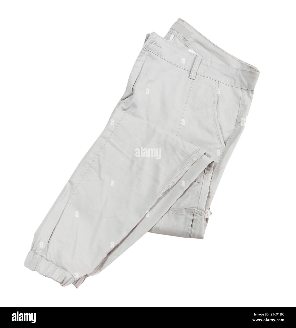 Pantaloni cargo isolati su pantaloni cargo bianchi ripiegati su sfondo bianco Foto Stock