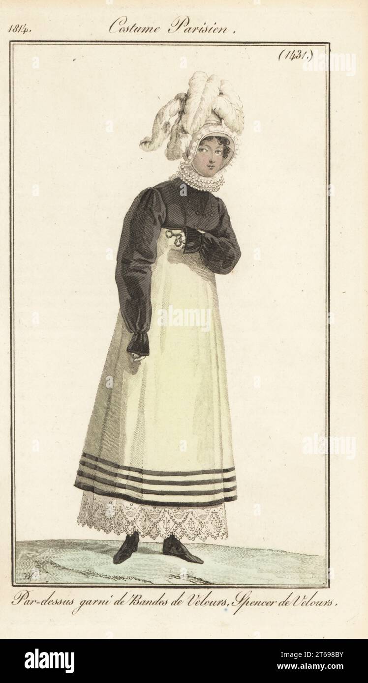 Donna alla moda con cofano a pizzo, giacca Spencer in velluto, abito con fasce in velluto, pettini in pizzo, lorgnette. Par-dessus garni de bandes de velours, spencer de velours. Incisione a mano di Jean Charles Baquoy su un piatto di Horace Vernet di Pierre de la Mesangeres Journal des Dames et des Modes, Magazine of Women and Fashion, Parigi, 1814. Foto Stock