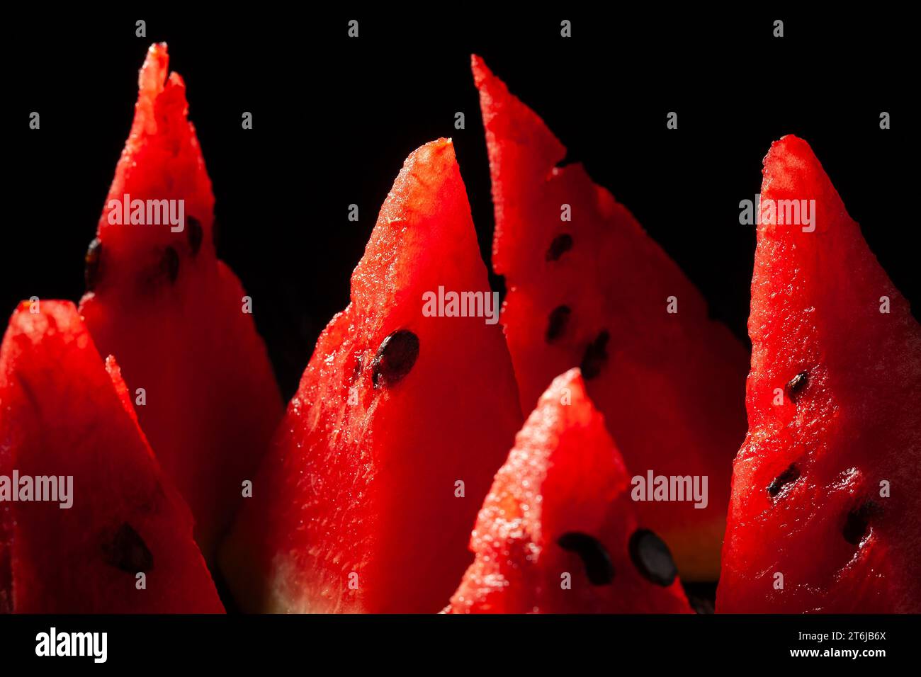 fetta di anguria su fondo di legno Foto Stock