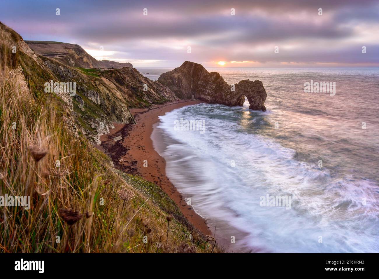 Durdle Door nel Dorset all'alba Foto Stock