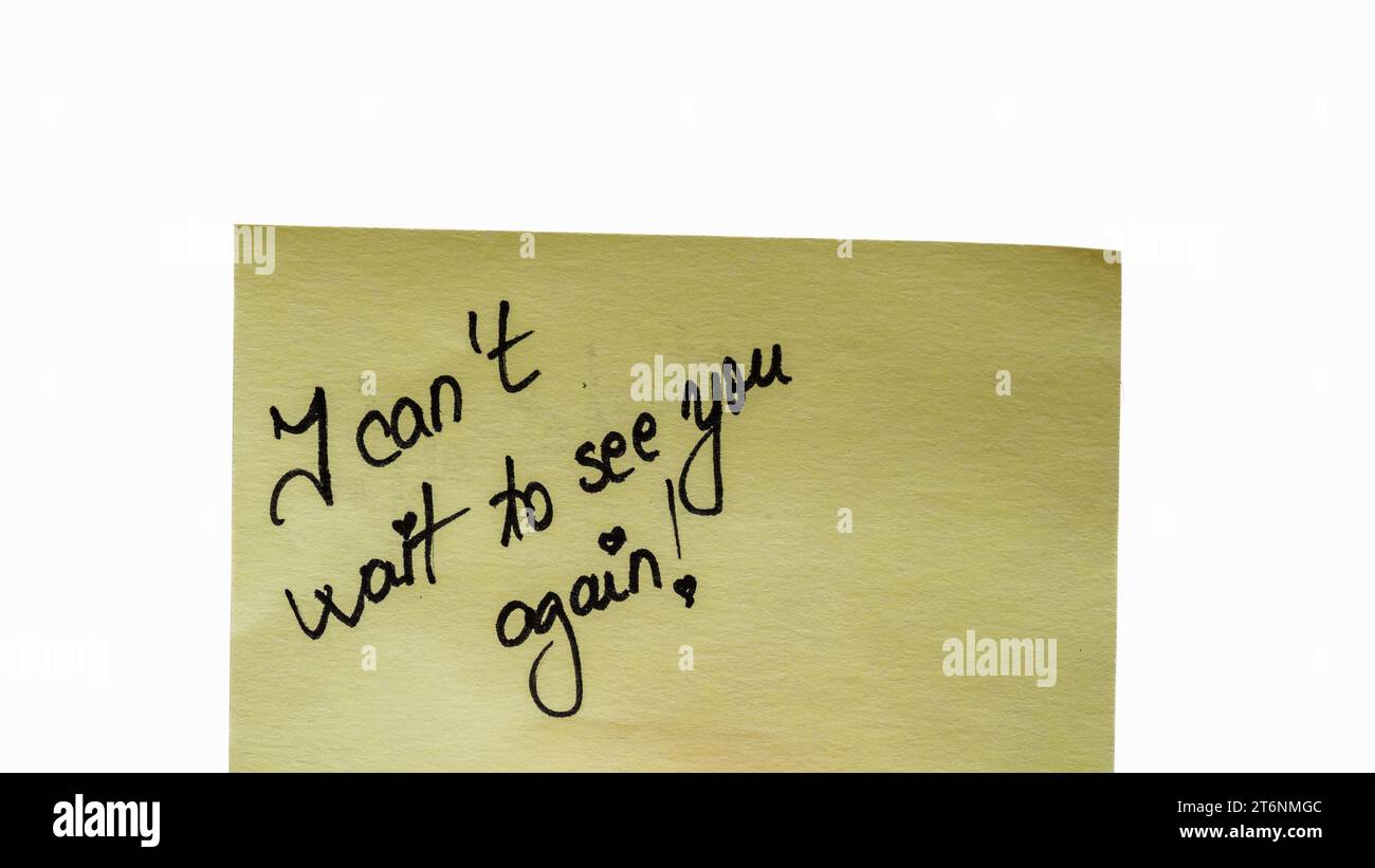 Non vedo lora di vederti di nuovo scrivere a mano testo vicino isolato su  carta gialla con spazio di copia Foto stock - Alamy