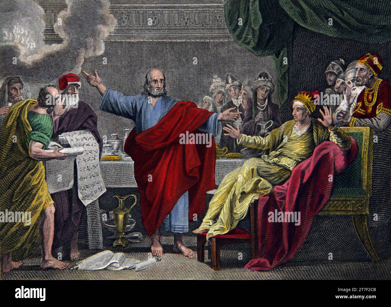 Illustrazione di Daniele che interpreta la scrittura a mano sul muro durante la festa di Belshazzar (Daniele) dalla Bibbia della famiglia di auto-interpretazione Foto Stock