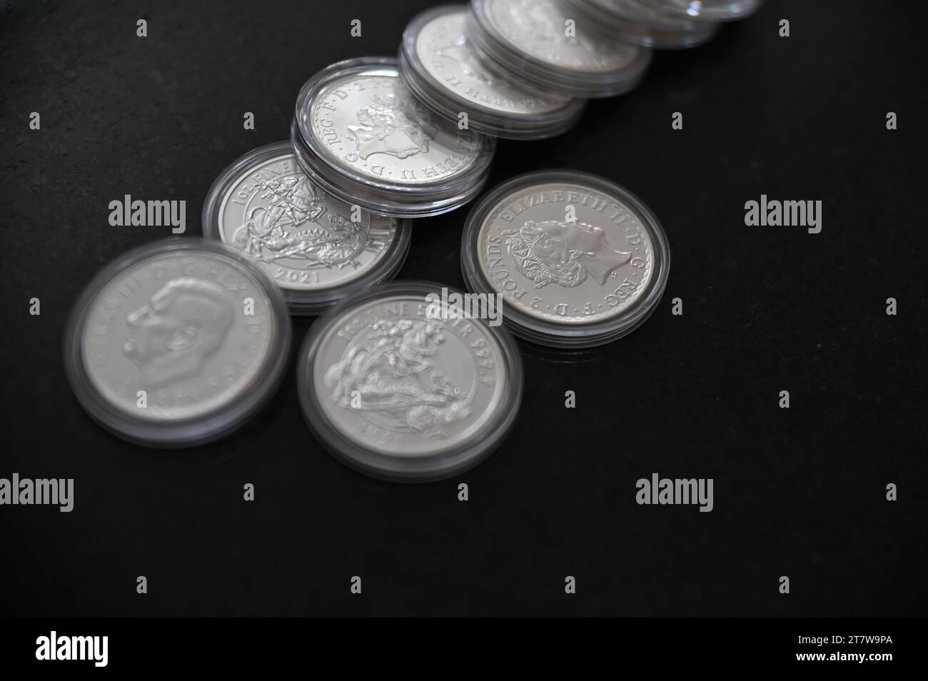 Un'oncia di monete Foto Stock
