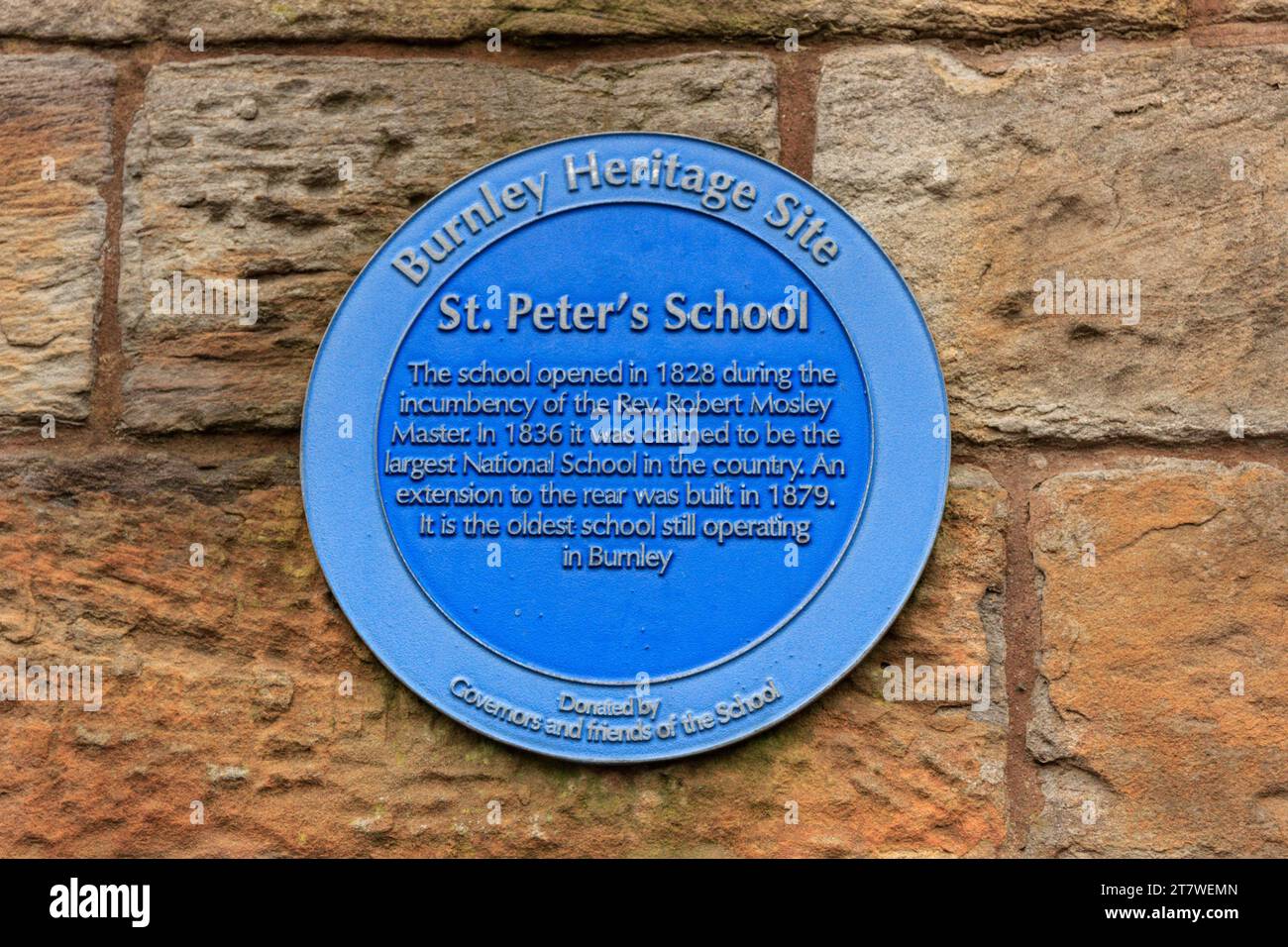 St La targa blu della scuola di Peter. Church Street Burnley. Foto Stock
