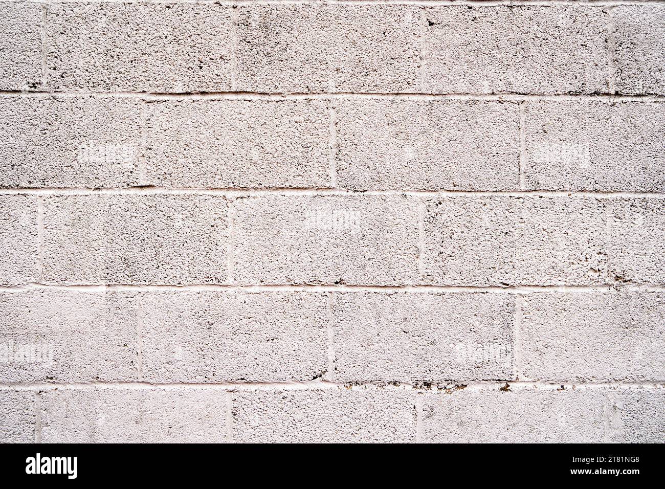 Di cemento grigio parete del blocco Foto Stock